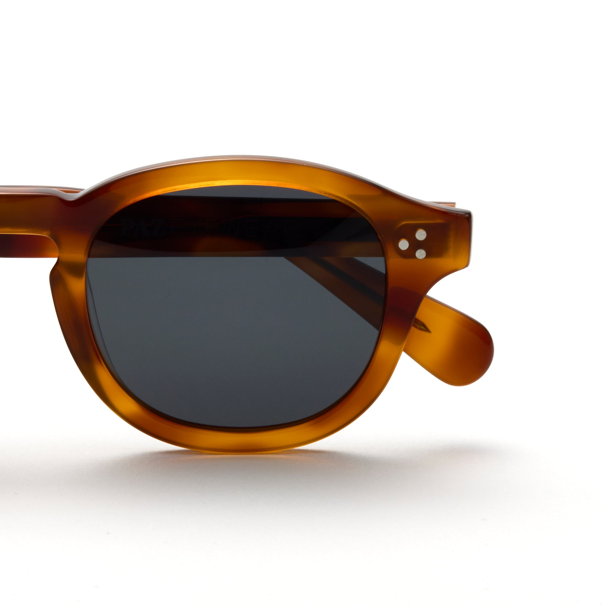 PAZ Eyewear Amber sunglasses in Honey color displayed on a white background